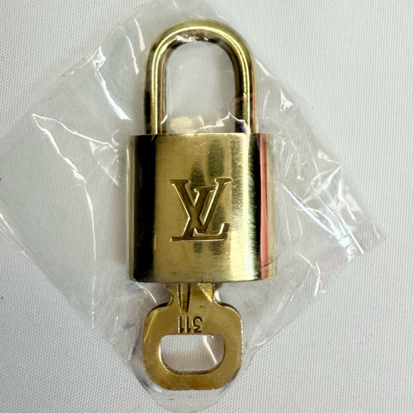 Louis Vuitton Accessories - Louis Vuitton Gold Padlock #311 with Key. VGUC